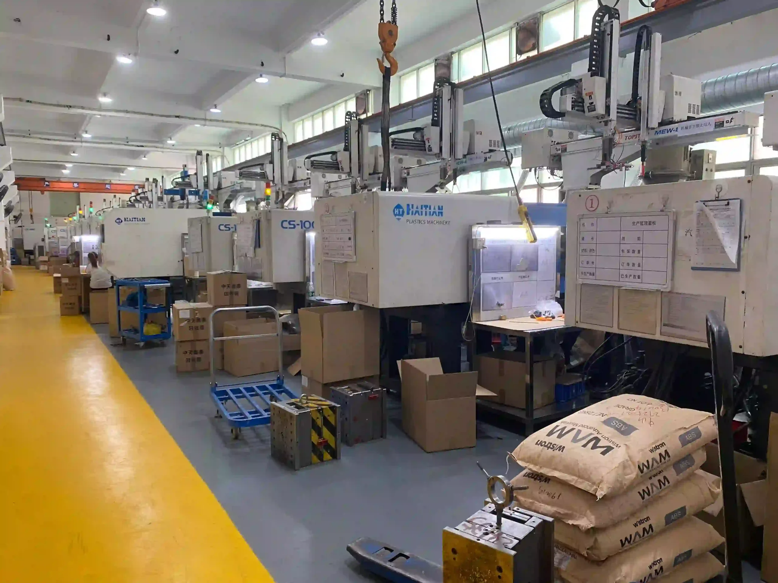 Injection molding machine used for plastic-part trials and production